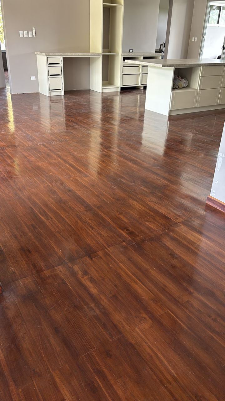 Teak flooring through a finished interior