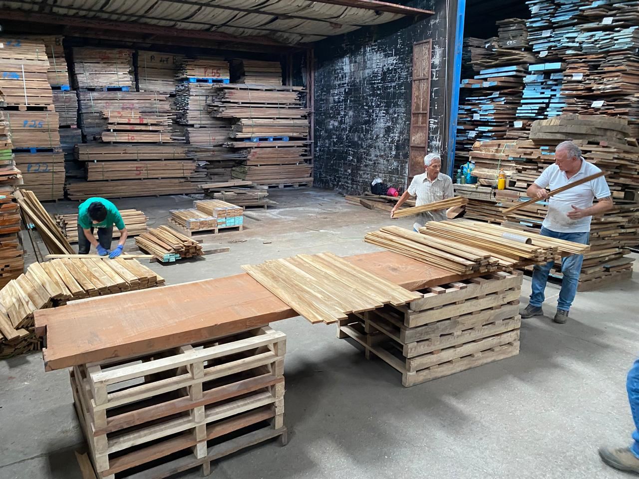 Workers sorting kiln-dried boards at the Costa Rican mill